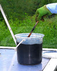 Stirring the woad vat